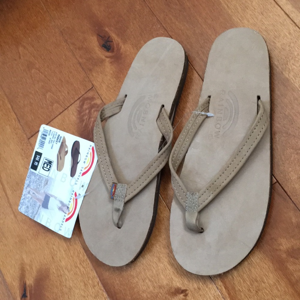 Brand new Rainbow flip flops.